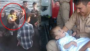 Bebeğini denize atmakla tehdit etti