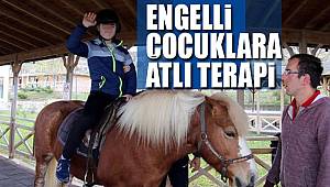 Engelli çocuklara at terapisi