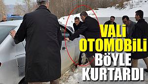 Vali kara saplanan otomobili kurtardı 